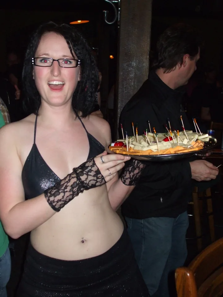 April serving a cheese tray as one of the original Matrimony -N- Cheese Cheese Girls on the first night